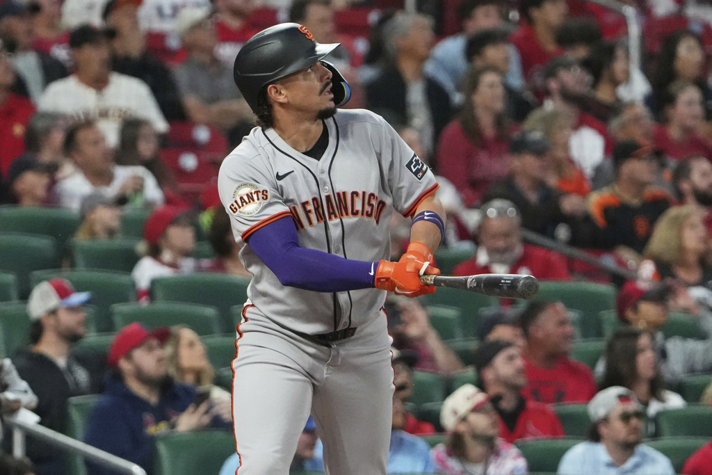 San Francisco Giants' Willy Adames watches his solo home run during the first inning of a baseball game against the St. Louis Cardinals Friday, Sept. 5, 2025, in St. Louis. (AP Photo/Jeff Roberson)
