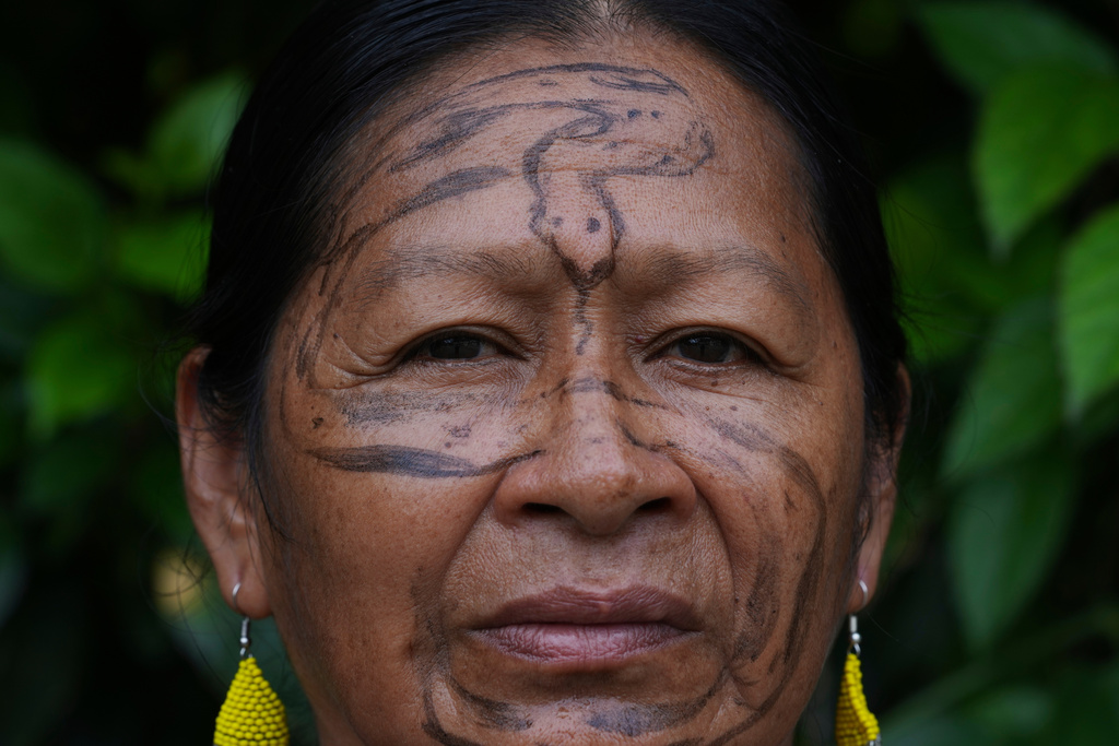 Flora Cadena, from the Andwa community, poses for a photo in Nueva Loja, Ecuador, Saturday, March 7, 2026. (AP Photo/Dolores Ochoa)