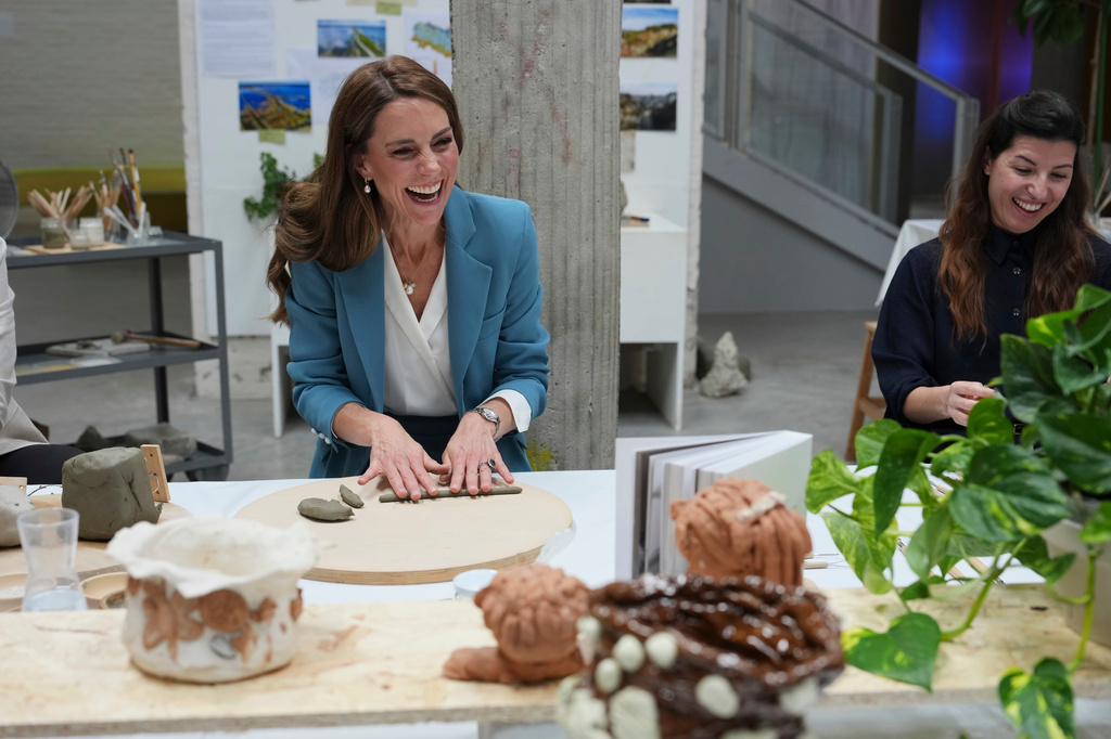 Britain's Kate, Princess of Wales, takes part in an immersive clay atelier workshop at the Loris Malaguzzi International Centre, part of a two-day trip, in Reggio Emilia, Italy, Wednesday, May 13, 2026. (AP Photo/Antonio Calanni, Pool)