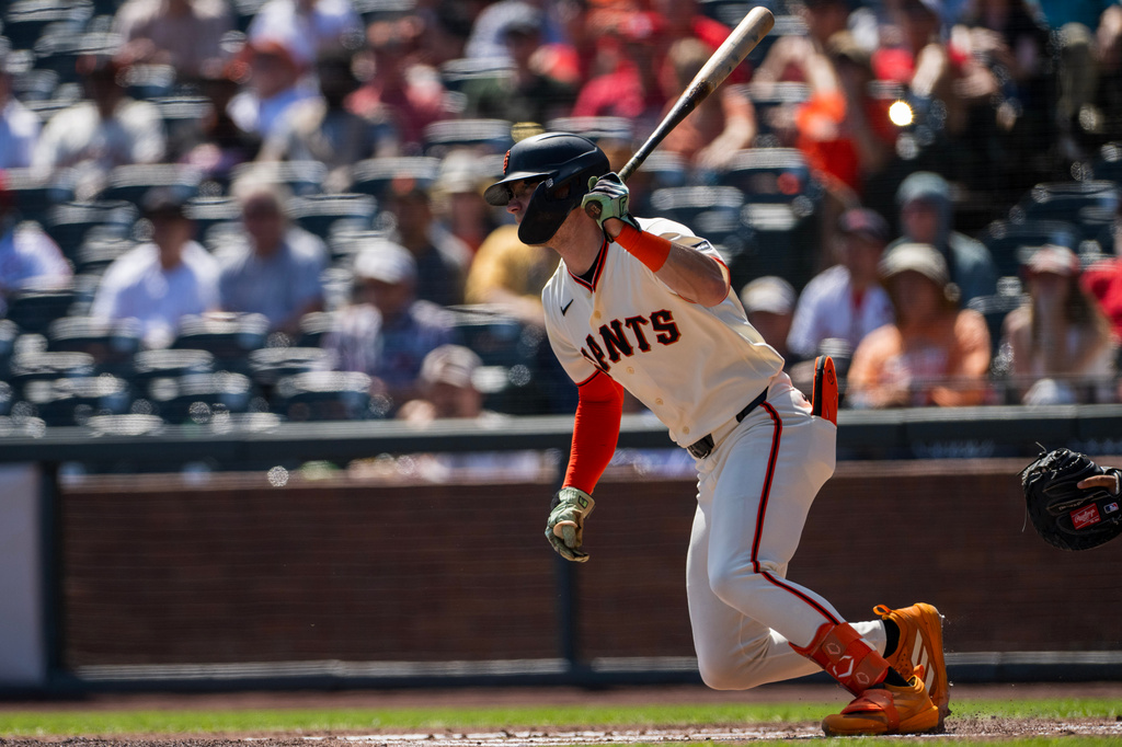 San Francisco Giants' Jonah Cox hits a single during the first inning of a baseball game against the St. Louis Cardinals in San Francisco, Wednesday, Sept. 9, 2026. (AP Photo/Nic Coury)