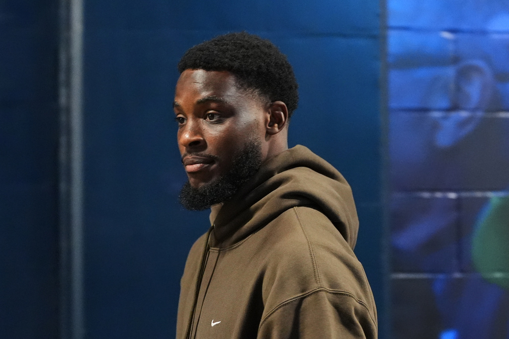 Seattle Seahawks cornerback Devon Witherspoon arrives for an NFL preseason football game against the Dallas Cowboys, Saturday, Aug. 15, 2026, in Seattle. (AP Photo/Lindsey Wasson)