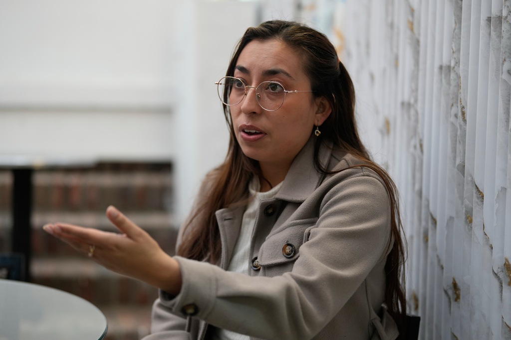 Diana Tique, the sister of Manuel Alejandro Tique who was arrested in Venezuela and is accused of being a mercenary, speaks during an interview in Bogota, Colombia, Monday, Oct. 27, 2025. (AP Photo/Fernando Vergara)