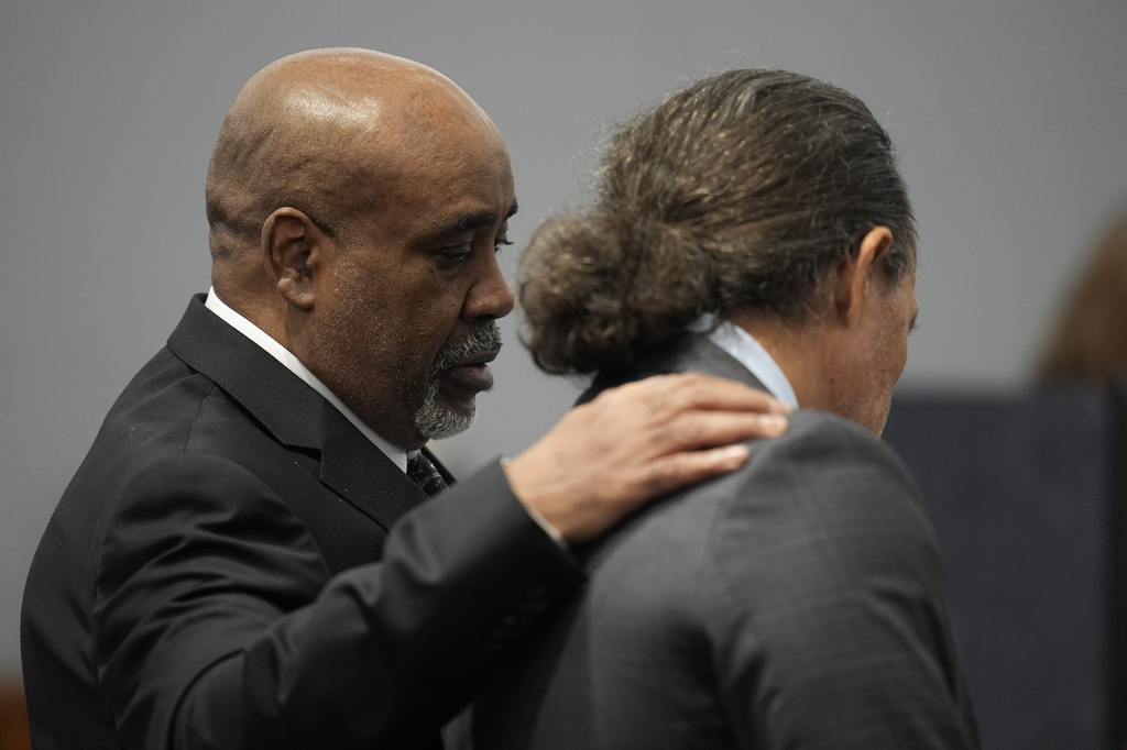 Duane "Keffe D" Davis, left, confers with defense attorney Michael Sanft in court for his murder trial related to the 1996 killing of rapper Tupac Shakur, at Clark County District Court Regional Justice Center in Las Vegas, on Tuesday, Aug. 18, 2026. (AP Photo/John Locher, Pool)
