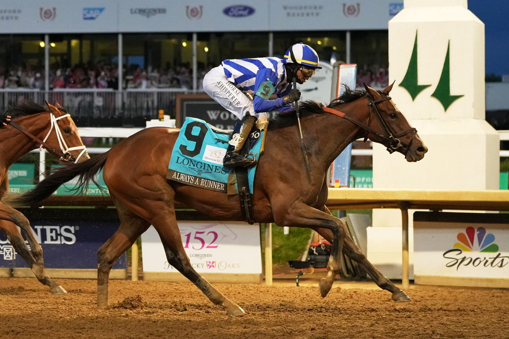 Always a Runner (9) ridden by Jose L. Ortiz wins the 152nd running of the Kentucky Oaks horse race at Churchill Downs, Friday, May 1, 2026, in Louisville, Ky. (AP Photo/Jeff Roberson)