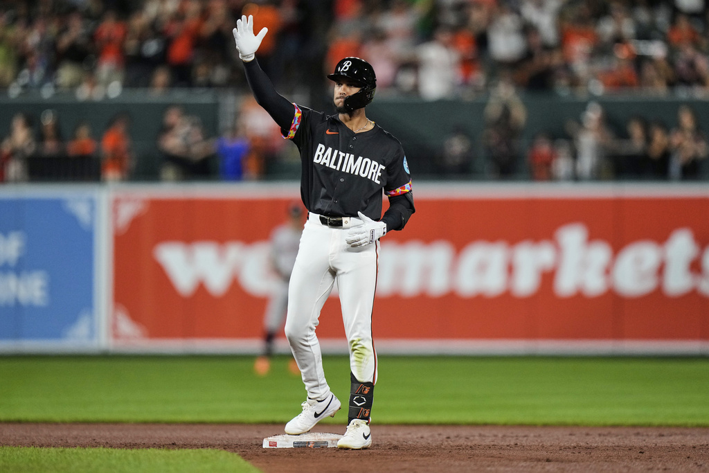 Baltimore Orioles' Jeremiah Jackson celebrates after hitting a two-run RBI double during the fourth inning of a baseball game against the Houston Astros, Friday, Aug. 22, 2025, in Baltimore. (AP Photo/Stephanie Scarbrough)