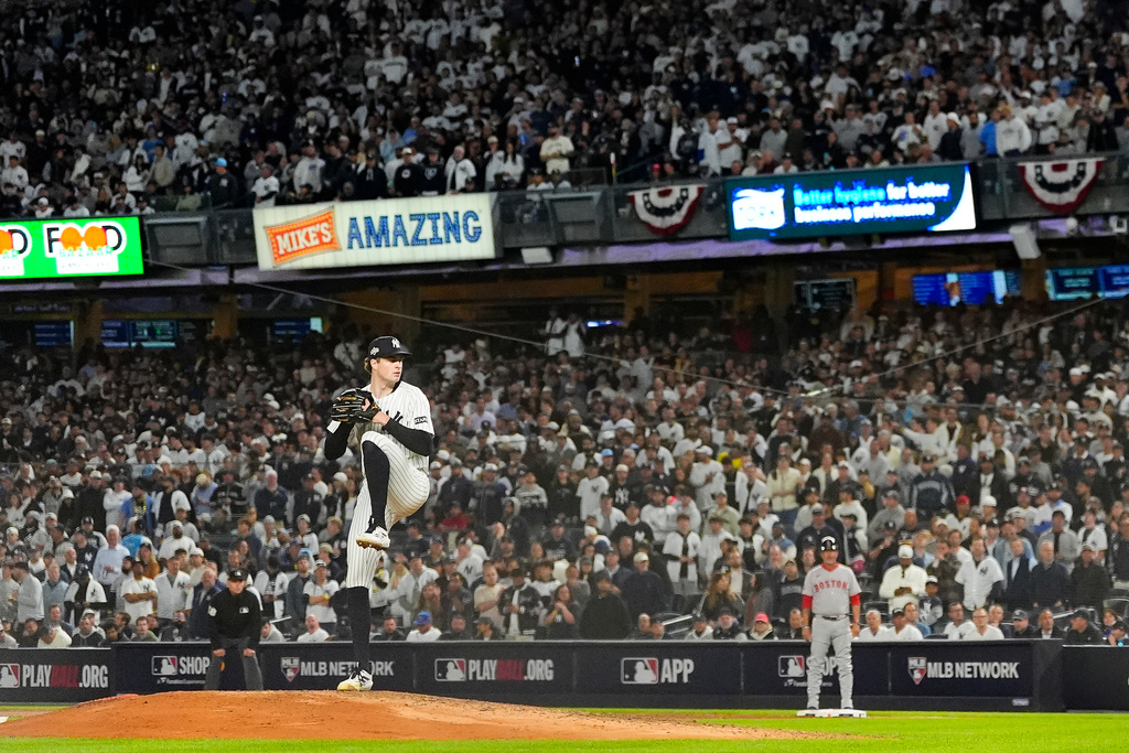 New York Yankees pitcher Cam Schlittler delivers against the Boston Red Sox during the eighth inning of Game 3 of an American League wild-card baseball playoff series, Thursday, Oct. 2, 2025, in New York. (AP Photo/Yuki Iwamura)