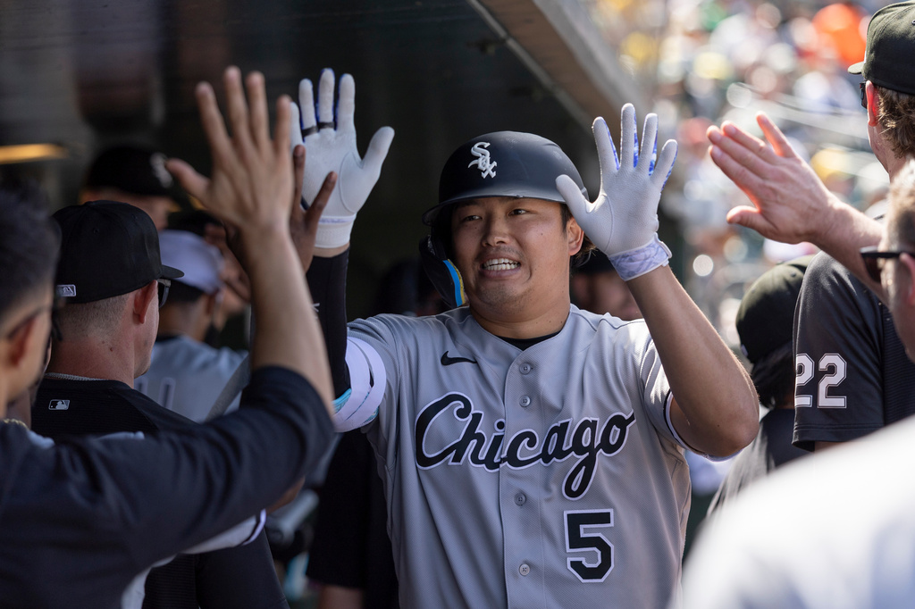 Chicago White Sox's Munetaka Murakami (5) celebrates after hitting a home run during the seventh inning of a baseball game against the Athletics, Saturday, April 18, 2026, in West Sacramento, Calif. (AP Photo/Sara Nevis)