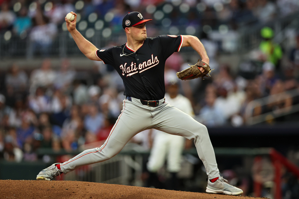 Washington Nationals pitcher Brad Lord delivers in the first inning of a baseball game against the Atlanta Braves, Tuesday, Sept. 23, 2025, in Atlanta. (AP Photo/Colin Hubbard)