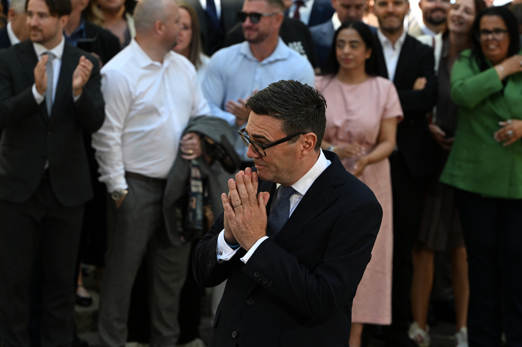 Britain's new Prime Minister Andy Burnham reacts as he speaks to staff and media at 10 Downing Street in London, Monday, July 20, 2026.(AP Photo/Thomas Krych)