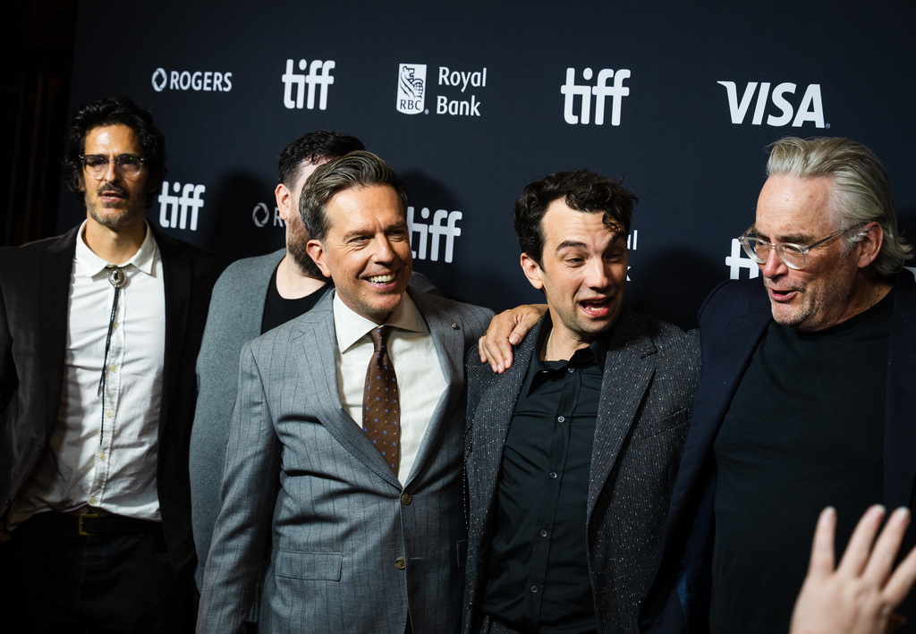 Ed Helms, front left, Jay Baruchel and Michael Dowse are pictured on the red carpet for "The Stunt Driver" at the Toronto International Film Festival in Toronto, Ontario, Friday, Sept. 11, 2026. (Laura Proctor/The Canadian Press via AP)