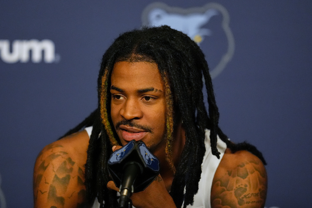 Memphis Grizzlies guard Ja Morant speaks during a news conference at the NBA basketball team's media day Monday, Sept. 29, 2025, in Memphis, Tenn. (AP Photo/George Walker IV)