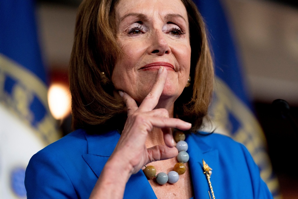 FILE - House Speaker Nancy Pelosi of Calif. reacts as she listens to a question from a reporter during her weekly press briefing on Capitol Hill, Thursday, Sept. 30, 2021, in Washington. (AP Photo/Andrew Harnik File)