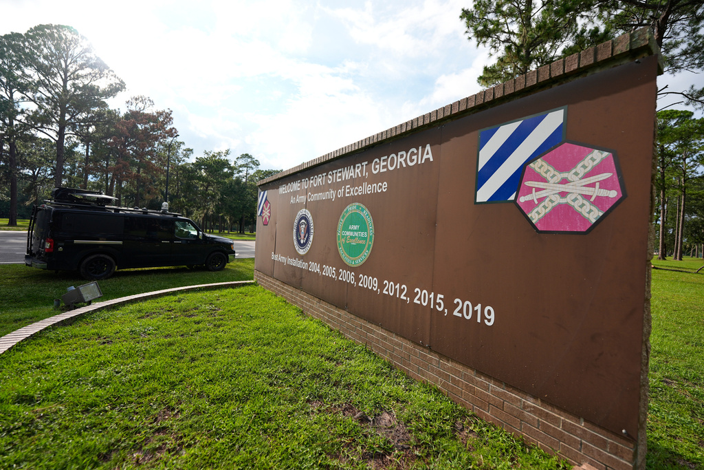 FILE - A sign welcoming people to Fort Stewart in Georgia is seen on Wednesday, Aug. 6, 2025. (AP Photo/Mike Stewart, File)