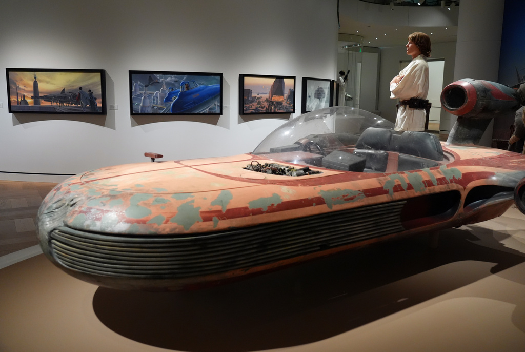 Luke Skywalker's landspeeder from the 1977 film "Star Wars: Episode IV - A New Hope" is pictured in the Cinema Gallery during a preview of the Lucas Museum of Narrative Art on Monday, Aug. 31, 2026, in Los Angeles. (AP Photo/Chris Pizzello)