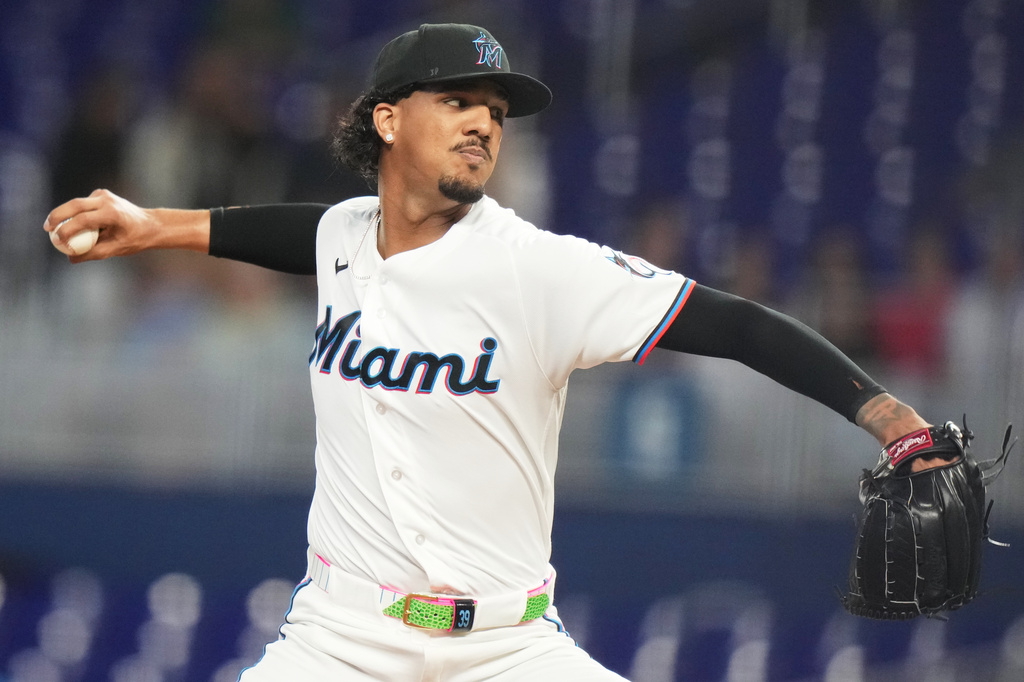 Miami Marlins starting pitcher Eury Perez throws during the first inning of a baseball game against the Cincinnati Reds, Wednesday, April 8, 2026, in Miami. (AP Photo/Lynne Sladky)