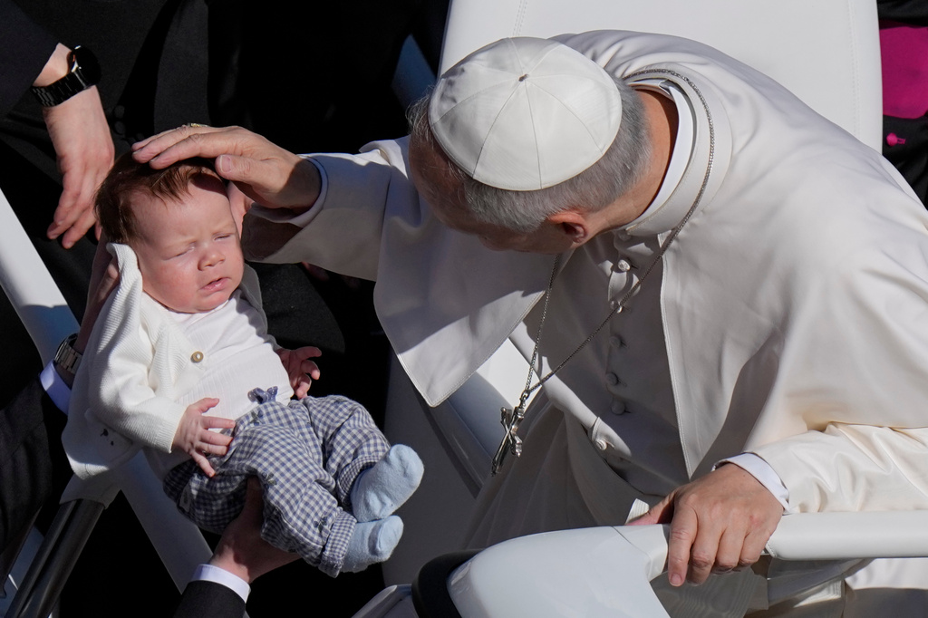 Pope Leo XIV greets the faithful at the end of Easter Mass he presided over in St. Peter's Square at the Vatican, Sunday, April 5, 2026. (AP Photo/Alessandra Tarantino)