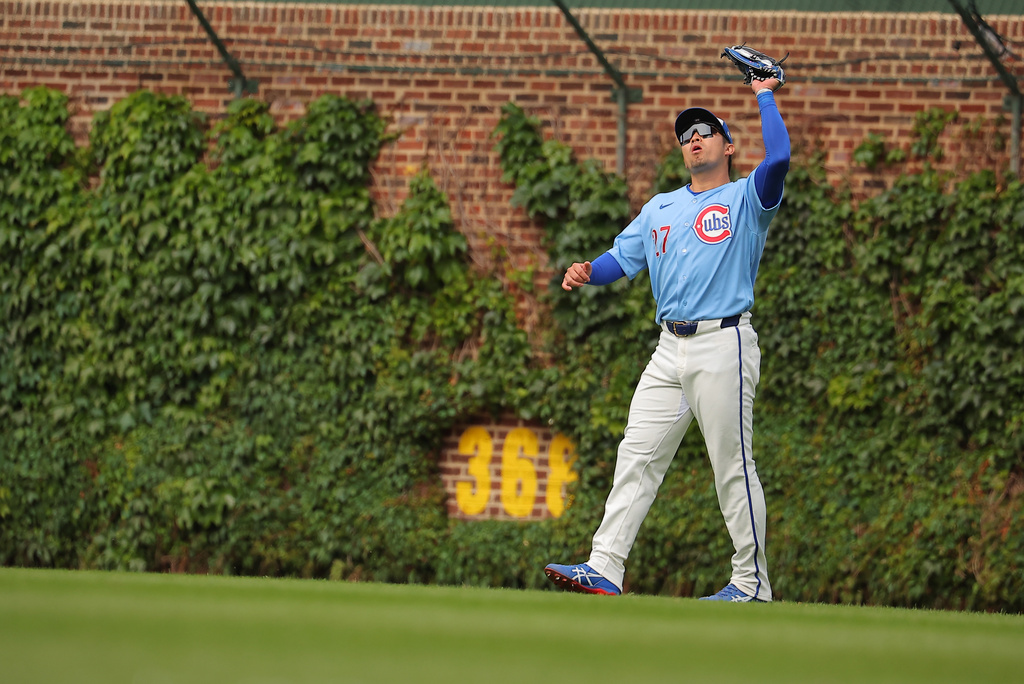 Chicago Cubs' Seiya Suzuki makes a catch during the ninth inning of a baseball game against the Houston Astros on Friday, May 22, 2026, in Chicago. (AP Photo/Melissa Tamez)