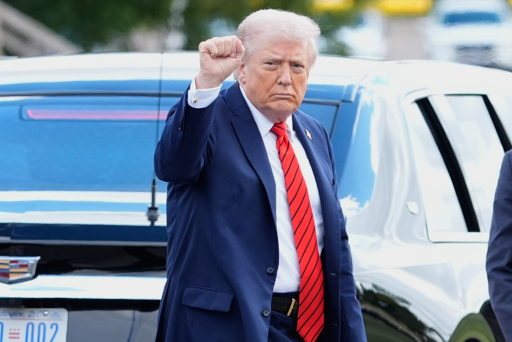 President Donald Trump departs Walter Reed National Military Medical Center in Bethesda, Md., Friday, Oct. 10, 2025. (AP Photo/Mark Schiefelbein)