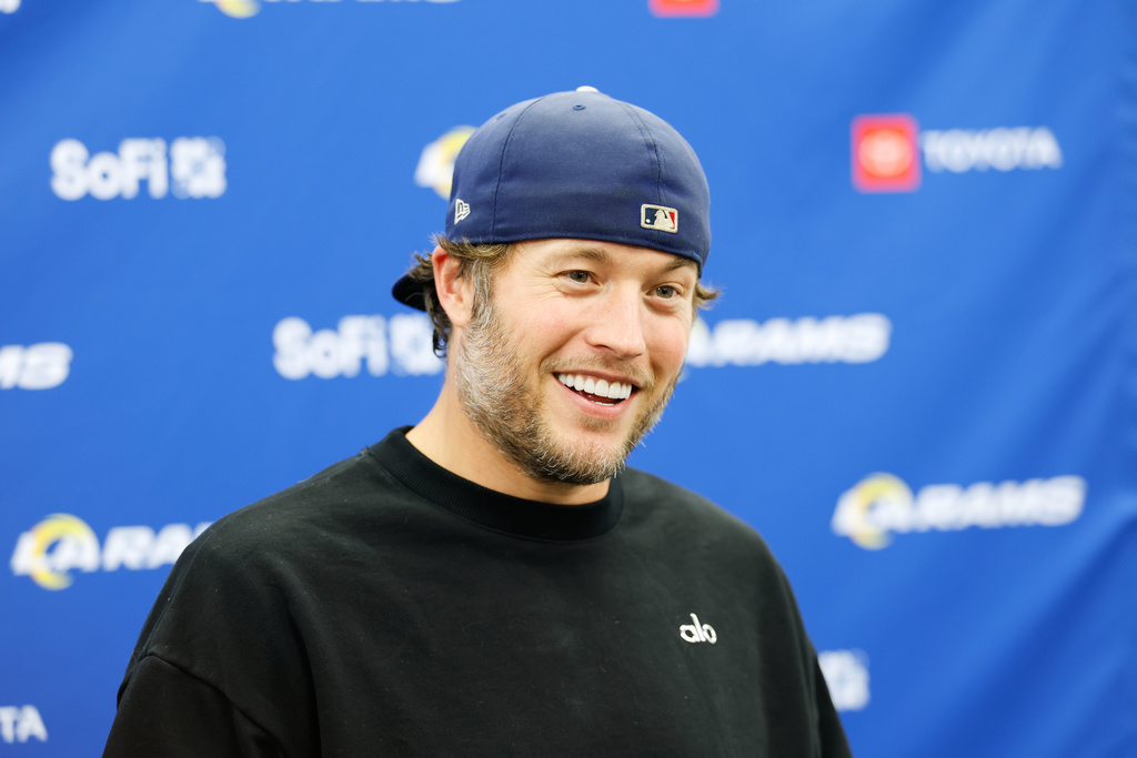 Los Angeles Rams quarterback Matthew Stafford answers question after an NFL wild-card playoff football game against the Carolina Panthers, Saturday, Jan. 10, 2026, in Charlotte, N.C. (AP Photo/Rusty Jones)