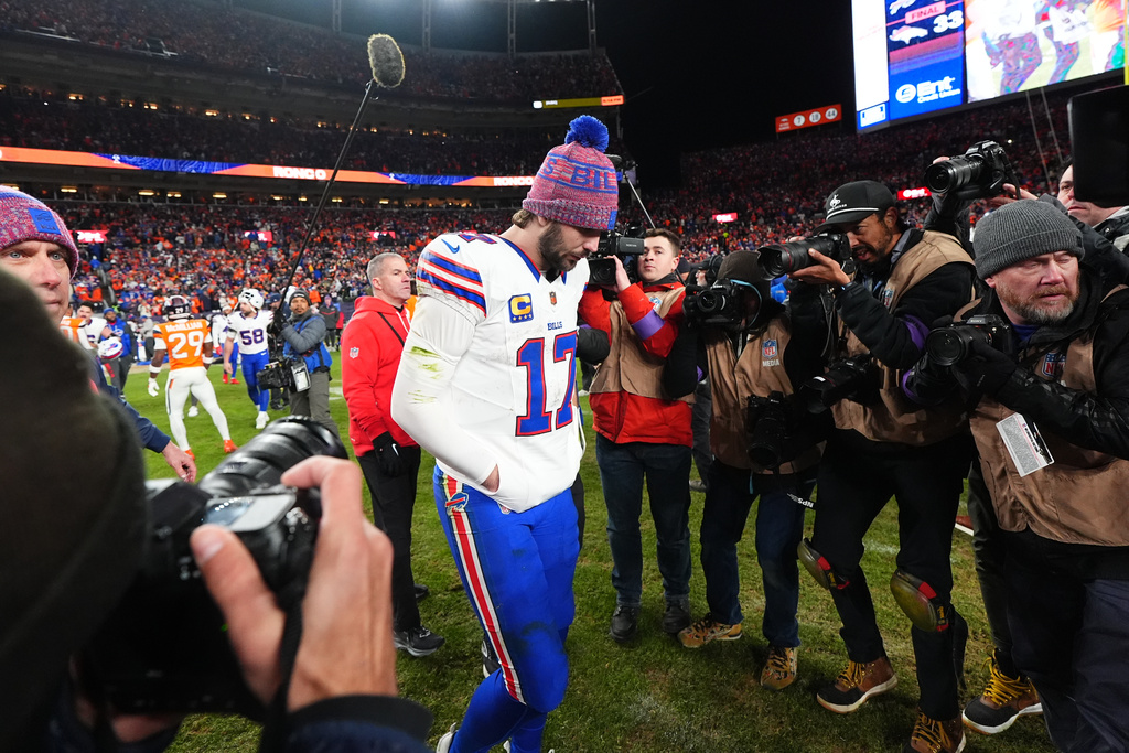 Buffalo Bills quarterback Josh Allen (17) leaves the field after an NFL divisional round playoff football game against the Denver Broncos, Saturday, Jan. 17, 2026, in Denver. (AP Photo/Jack Dempsey)