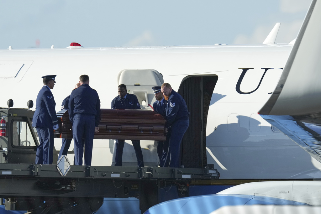 The casket containing the body of Charlie Kirk, the CEO and co-founder of Turning Point USA who was shot and killed on Wednesday is removed from Air Force Two at Phoenix Sky Harbor International Airport, Thursday, Sept. 11, 2025, in Phoenix. (AP Photo/Ross D. Franklin)