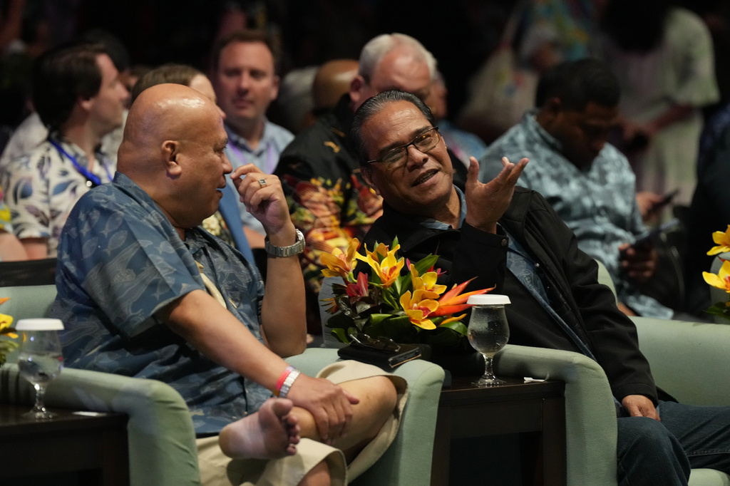 President of the Federated States of Micronesia Wesley Simina, right, reacts ahead of a closing ceremony at the Pacific Islands Forum Leaders Meeting in Koror, Palau, Thursday, Sept. 3, 2026. (AP Photo/Charlotte Graham-McLay)