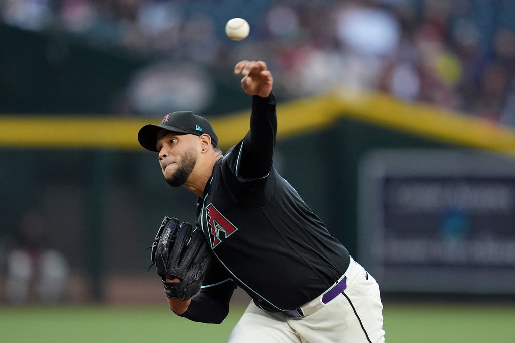 Arizona Diamondbacks starting pitcher Eduardo Rodriguez throws against the Chicago White Sox during the first inning of a baseball game, Wednesday, April 22, 2026, in Phoenix. (AP Photo/Ross D. Franklin)