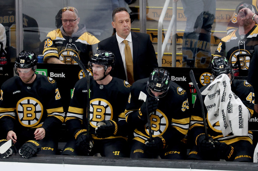 Boston Bruins head coach Marco Sturm, center top, watches from the bench during the first period of an NHL hockey game against the Chicago Blackhawks, Thursday, Oct. 9, 2025, in Boston. (AP Photo/Mark Stockwell) Boston Bruins head coach Marco Sturm, center top, watches from the bench during the first period of an NHL hockey game against the Chicago Blackhawks, Thursday, Oct. 9, 2025, in Boston. (AP Photo/Mark Stockwell)