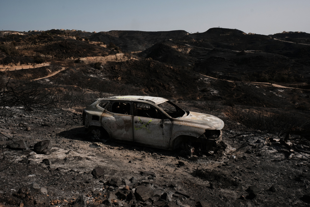 A view of a burnt area affected by wildfires in Bedar, near Almeria, Spain, Saturday, July 11, 2026. (AP Photo/Gregorio Marrero)
