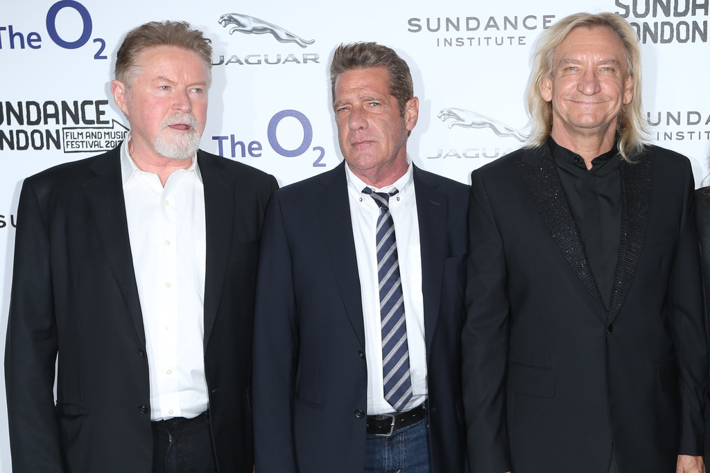 FILE - Members of the rock band The Eagles, from left, Don Henley, Glenn Frey, and Joe Walsh appear at a screening of "History of The Eagles Part One," as part of the Sundance Film Festival in the UK, in east London on April 25, 2013. (Photo by Joel Ryan/Invision/AP, File)