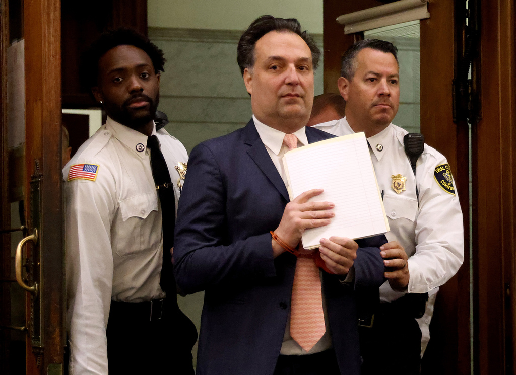 Brian Walshe enters the courtroom for his trial for murdering his wife Ana, Thursday, Dec. 4, 2025, in Dedham, Mass. (Matt Stone/The Boston Herald via AP, Pool)