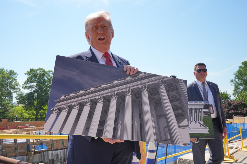 President Donald Trump tours Ballroom construction around the outside the White House, Tuesday, May 19, 2026, in Washington. (AP Photo/Jacquelyn Martin)
