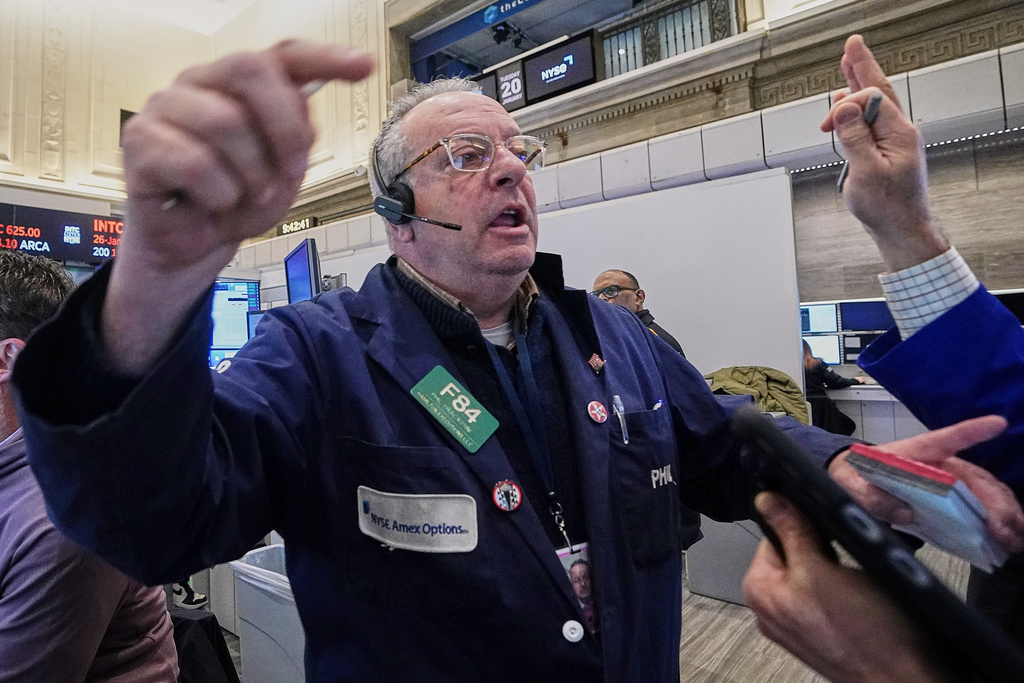 Options trader Phil Fracassini works on the floor of the New York Stock Exchange, Tuesday, Jan. 20, 2026. (AP Photo/Richard Drew)