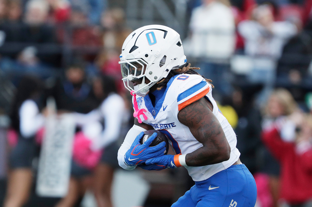 Boise State running back Dylan Riley (0) carries the ball during the first half of an NCAA college football game against Washington State, Saturday, Oct. 24, 2026, in Pullman, Wash. (AP Photo/Young Kwak)