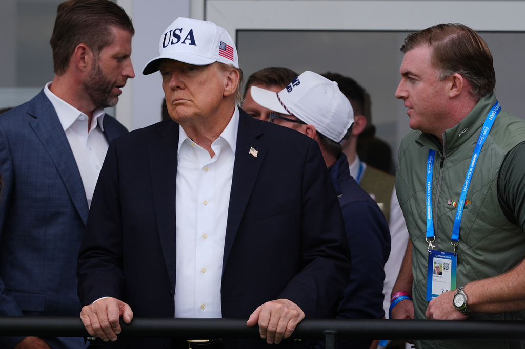 President Donald Trump watches as Shane Lowry from Ireland wins the Irish Open golf tournament at Trump International Golf Links Ireland, Sunday, Sept. 13, 2026, in Doonbeg, Ireland. (AP Photo/Julia Demaree Nikhinson)