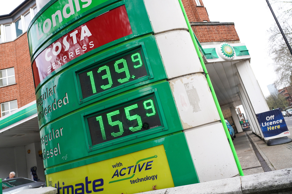 Prices are displayed at a gas station in London, Monday, March 9, 2026. (AP Photo/Alberto Pezzali)