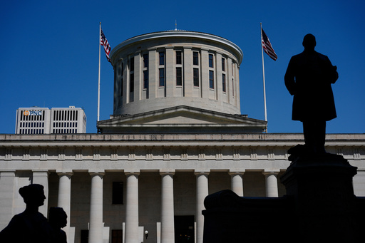 FILE - The William McKinley Monument is silhouetted in front of the west side of the Ohio Statehouse, April 15, 2024, in Columbus, Ohio. (AP Photo/Carolyn Kaster, File) FILE - The William McKinley Monument is silhouetted in front of the west side of the Ohio Statehouse, April 15, 2024, in Columbus, Ohio. (AP Photo/Carolyn Kaster, File)