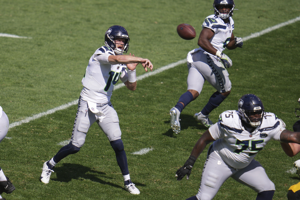Seattle Seahawks quarterback Sam Darnold (14) throws a touchdown pass during the second half of an NFL football game against the Pittsburgh Steelers, Sunday, Sept. 14, 2025, in Pittsburgh. (AP Photo/Gene J Puskar)