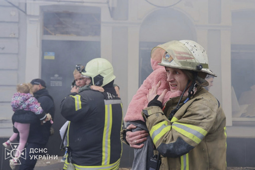 In this photo provided by the Ukrainian Emergency Service, rescuers evacuate children after Russian drones hit a city kindergarten during an attack in Kharkiv, Ukraine, Wednesday, Oct. 22, 2025. (Ukrainian Emergency Service via AP) In this photo provided by the Ukrainian Emergency Service, rescuers evacuate children after Russian drones hit a city kindergarten during an attack in Kharkiv, Ukraine, Wednesday, Oct. 22, 2025. (Ukrainian Emergency Service via AP)