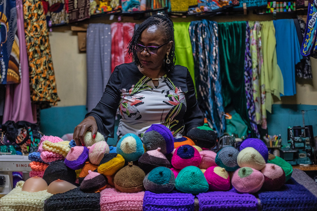 Mary Mwangi, 52, a breast cancer survivor, displays knitted breast prostheses at her shop in Thika, Kiambu County, Kenya, Friday, Jan. 30, 2026. (AP Photo/Samson Otieno)