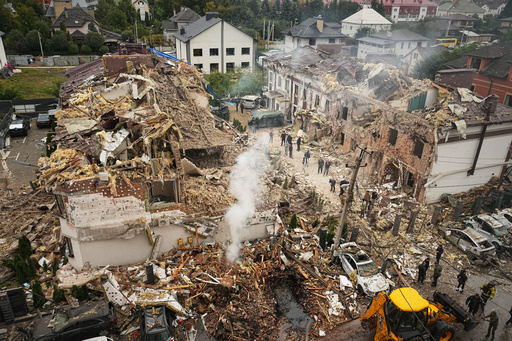 Rescuers work at the site of an apartment buildings damaged during a Russian attack in Kyiv, Ukraine, Sunday, Sept. 28, 2025. (AP Photo/Efrem Lukatsky) Rescuers work at the site of an apartment buildings damaged during a Russian attack in Kyiv, Ukraine, Sunday, Sept. 28, 2025. (AP Photo/Efrem Lukatsky)