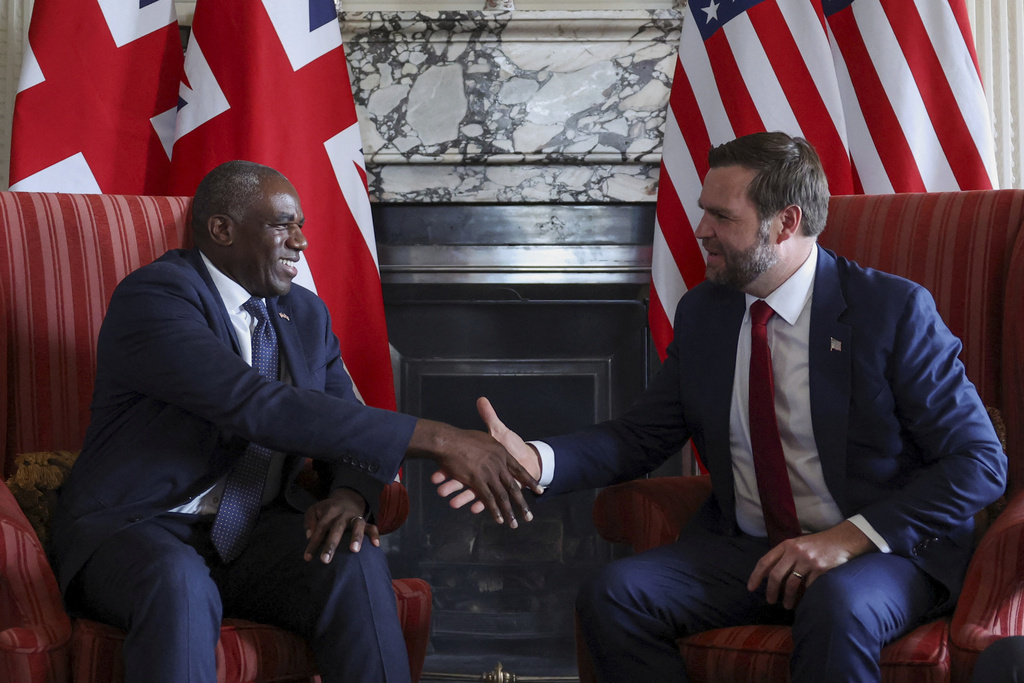 Britain's Foreign Secretary David Lammy, left, and US Vice President JD Vance during a meeting at Chevening House in Kent, England, Friday, Aug. 8, 2025. (Suzanne Plunkett/Pool via AP)