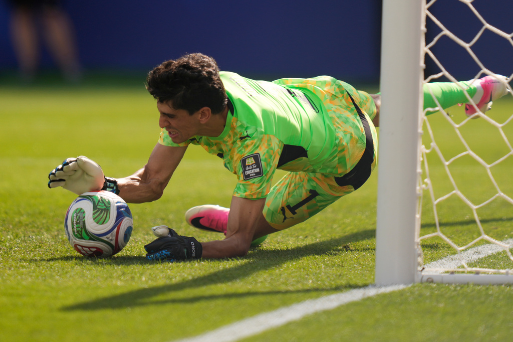 Morocco goalkeeper Yassine Bounou (1) saves a penalty kick by France's Kylian Mbappe during the World Cup quarterfinal soccer match between France and Morocco in Foxborough, Mass., near Boston, Thursday, July 9, 2026. (AP Photo/Charles Krupa)