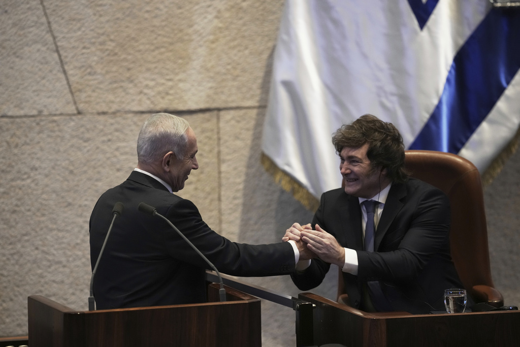FILE - Israel's Prime Minister Benjamin Netanyahu, left, greets Argentina's President Javier Milei in the Knesset, Israel's parliament, in Jerusalem, Wednesday, June 11, 2025. (AP Photo/Ohad Zwigenberg, File)