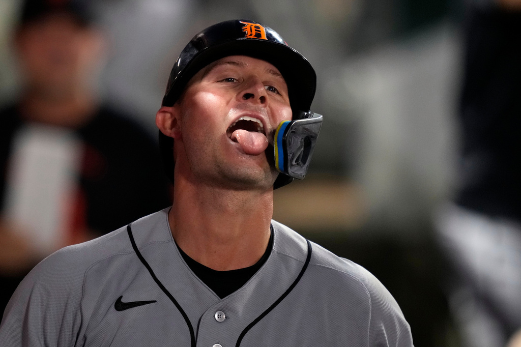 Detroit Tigers' Spencer Torkelson sticks his tongue out as seeds are thrown at him in the dugout after hitting a solo home run during the fifth inning of a baseball game against the Los Angeles Angels, Saturday, July 18, 2026, in Anaheim, Calif. (AP Photo/Mark J. Terrill)