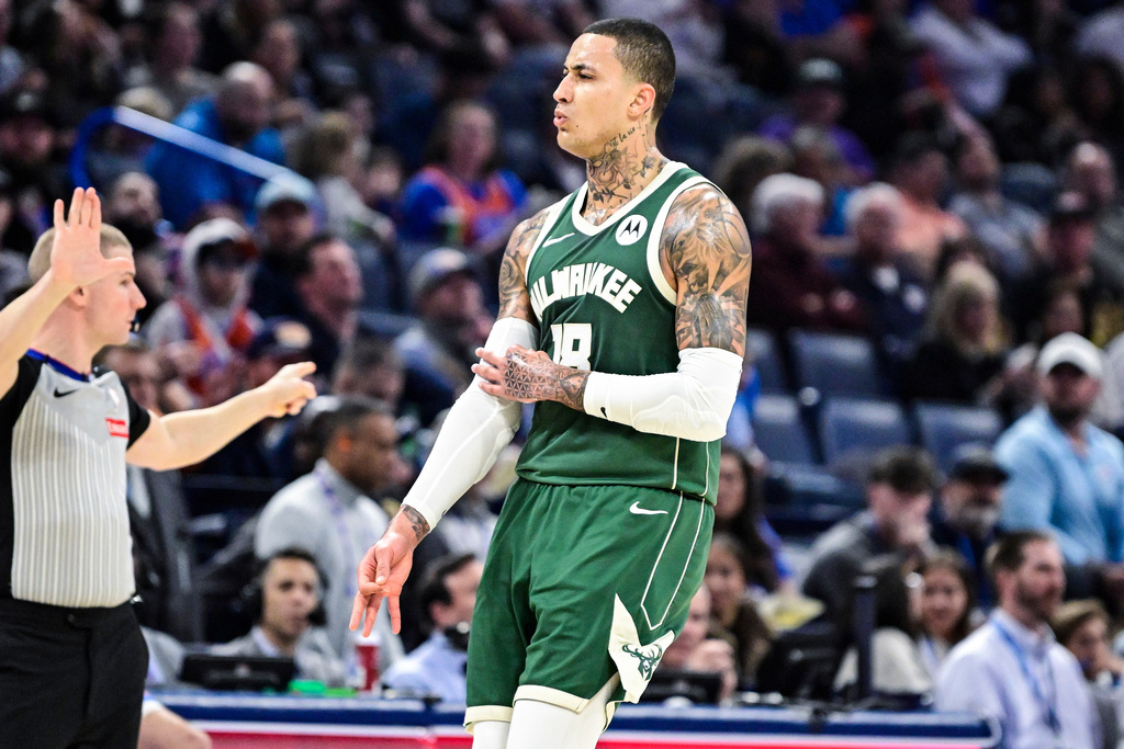 Milwaukee Bucks forward Kyle Kuzma celebrates against the Oklahoma City Thunder during the first half of an NBA basketball game, Thursday, Feb. 12, 2026, in Oklahoma City. (AP Photo/Gerald Leong)