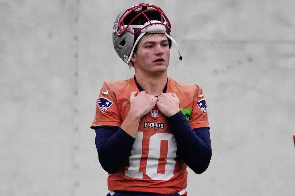 New England Patriots quarterback Drake Maye watches teammates during an NFL football availability, Thursday, Jan. 29, 2026, in Foxborough, Mass. (AP Photo/Charles Krupa)