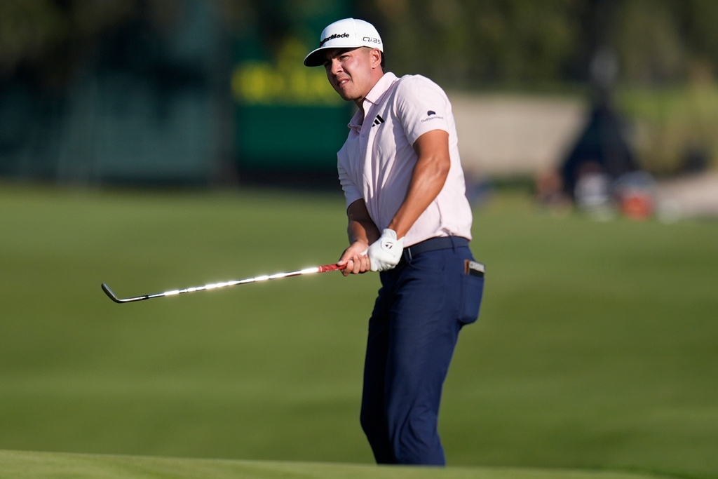 Michael Thorbjornsen watches his ball on the 13th green during the third round of the RSM Classic golf tournament, Saturday, Nov. 22, 2025, in St. Simons Island, Ga. (AP Photo/Mike Stewart)
