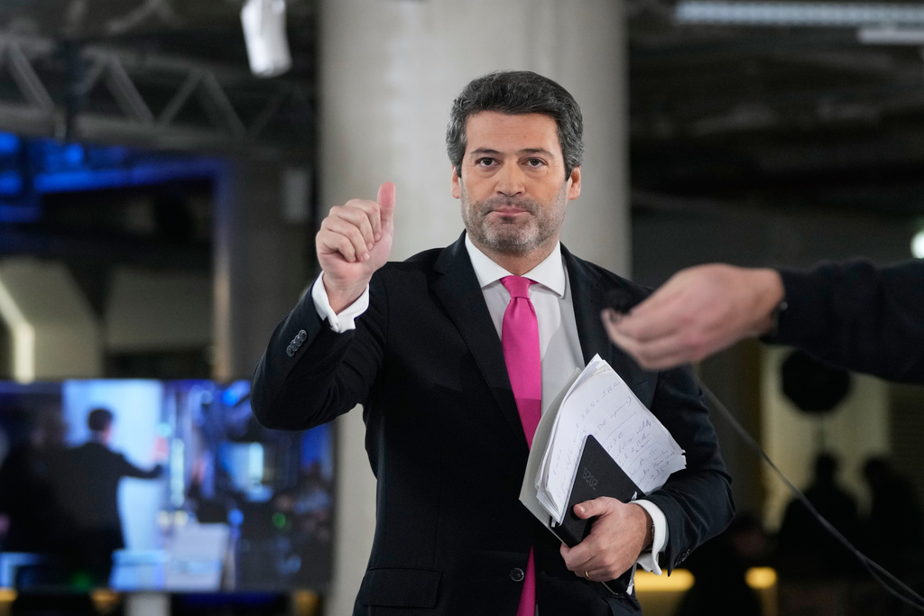 Presidential candidate Andre Ventura, of the populist Chega party, arrives for a television debate with opponent Antonio Jose Seguro, of the center-left Socialist Party, ahead of the Feb. 8 presidential election, in Lisbon, Tuesday, Jan. 27, 2026. (AP Photo/Armando Franca)
