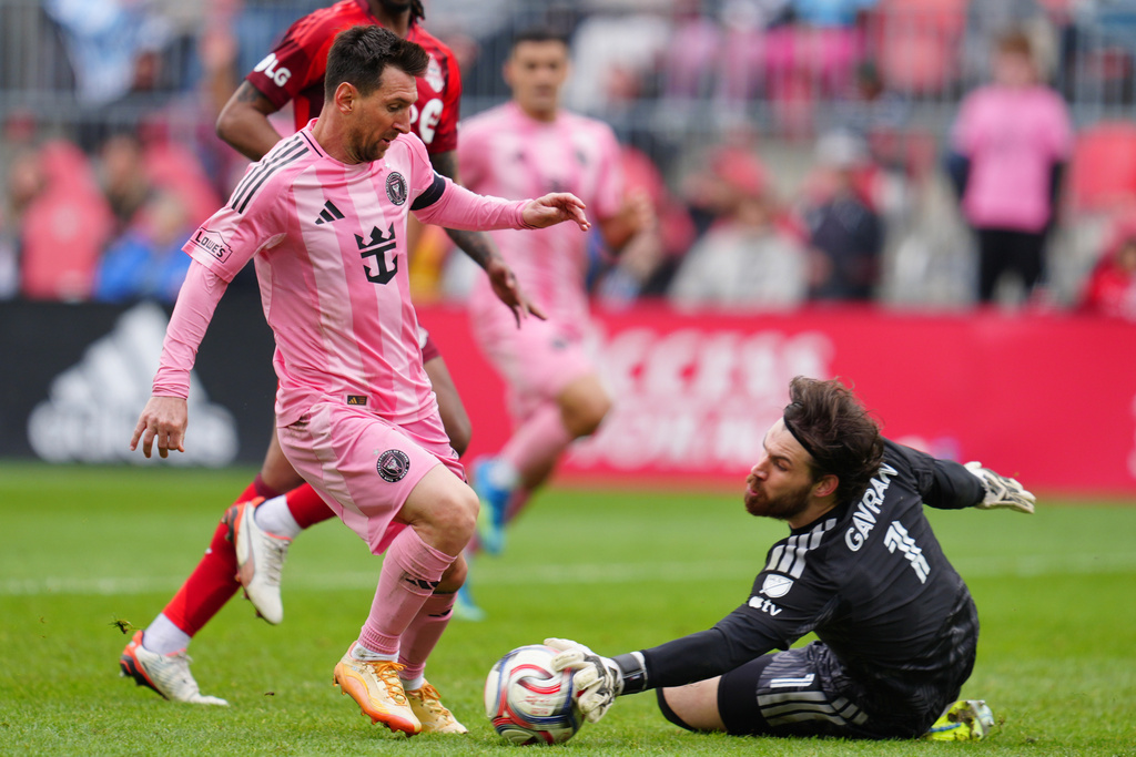 Toronto FC goalkeeper Luka Gavran (1) stops Inter Miami CF midfielder Lionel Messi (10) during second half MLS soccer in Toronto on Saturday, May 9, 2026. (Frank Gunn /The Canadian Press via AP)